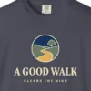 Close-up of the A Good Walk print on a Navy Comfort Colors 1717 tee