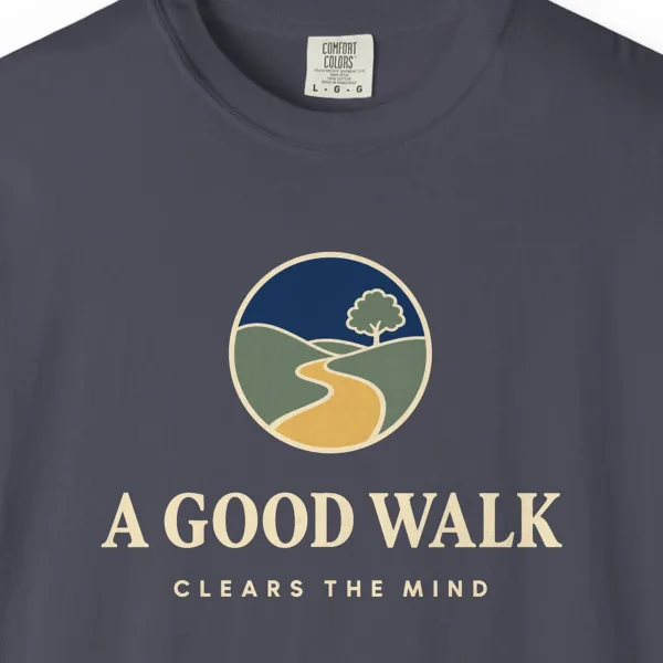 Close-up of the A Good Walk print on a Navy Comfort Colors 1717 tee