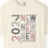 Close-up of the A Year of New Dreams print on a Ivory Comfort Colors 1717 tee