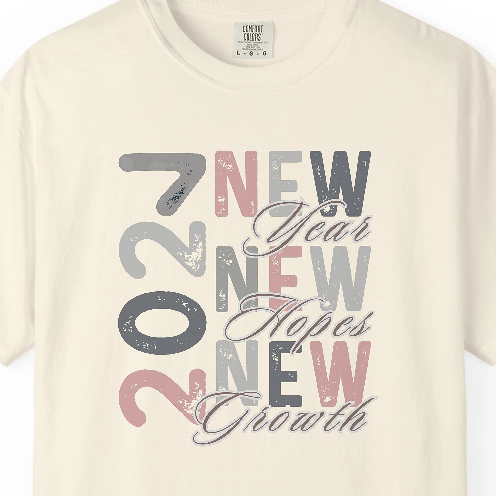 a-year-of-new-dreams-tee-ivory-chest Close-up of the A Year of New Dreams print on a Ivory Comfort Colors 1717 tee