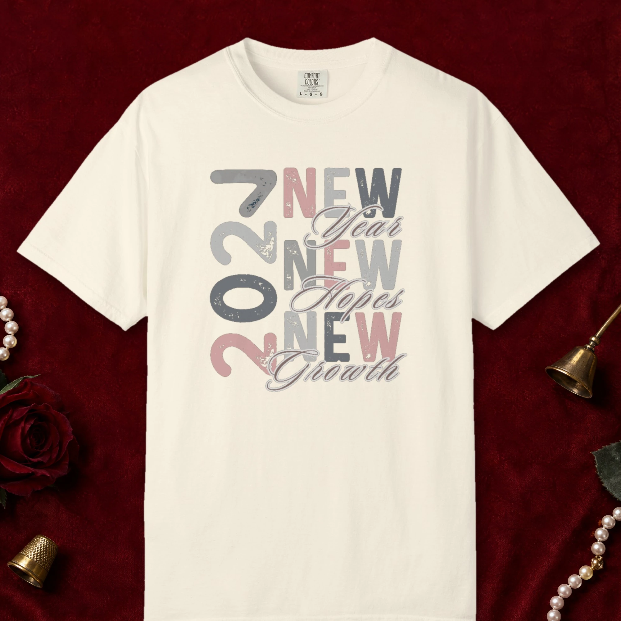 A Year of New Dreams design on a Ivory Comfort Colors 1717 tee, laid flat