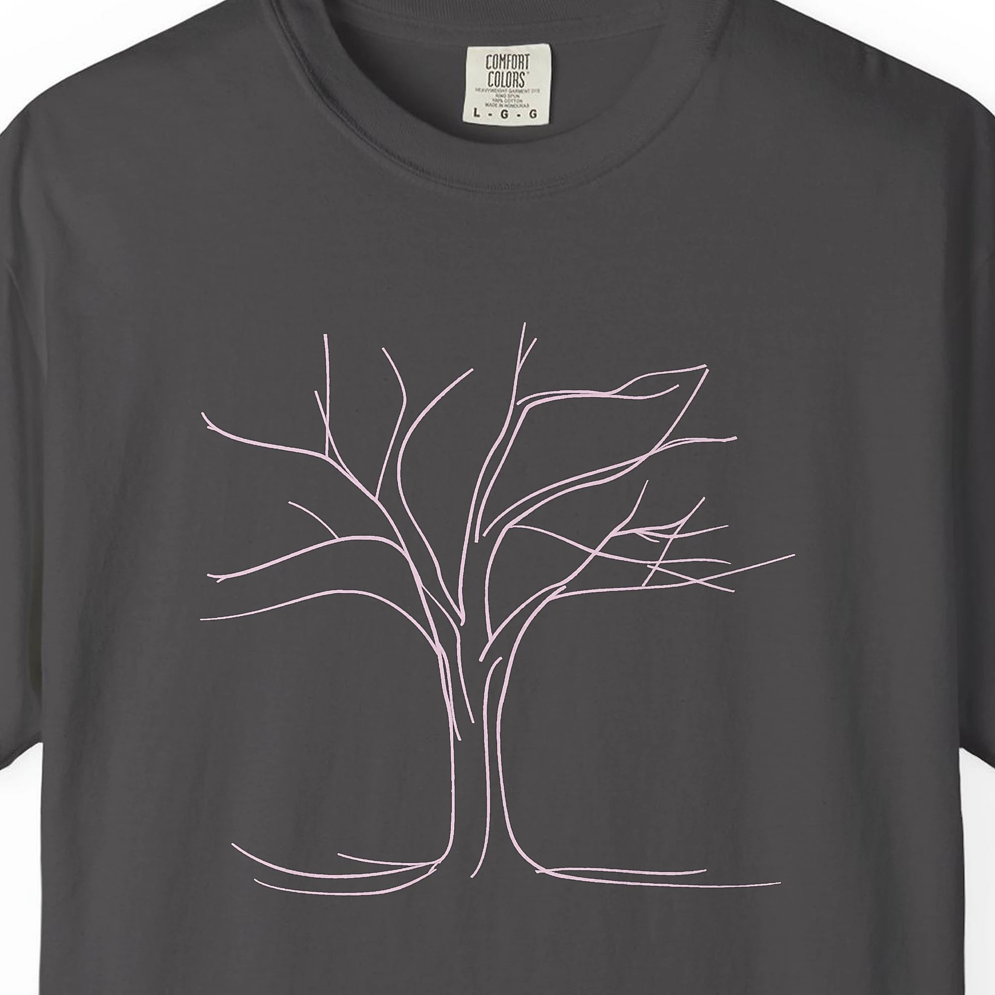 Close-up of the Arching Branches print on a Graphite Comfort Colors 1717 tee