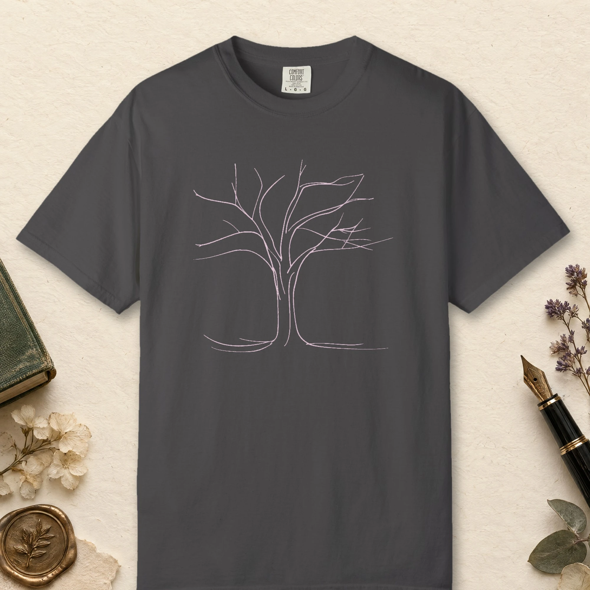 Arching Branches design on a Graphite Comfort Colors 1717 tee, laid flat