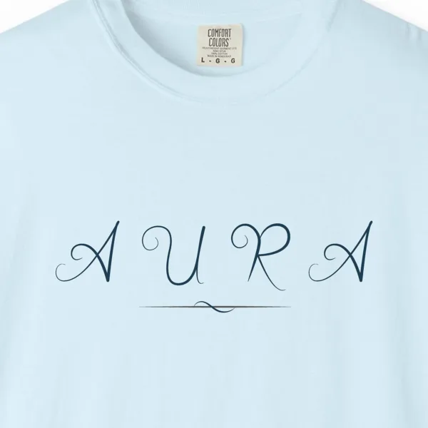 Close-up of the Aura Swash print on a Chambray Comfort Colors 1717 tee