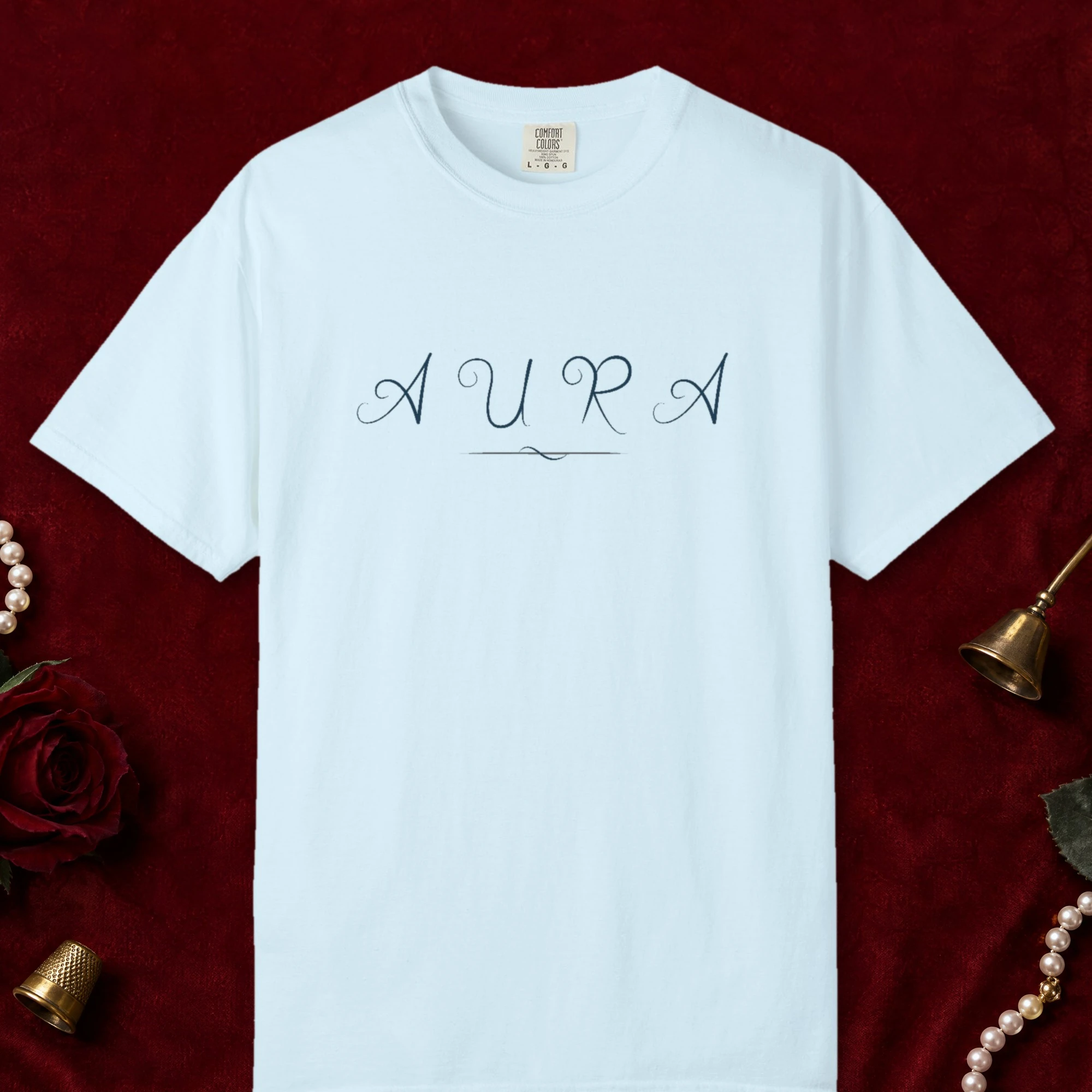 Aura Swash design on a Chambray Comfort Colors 1717 tee, laid flat
