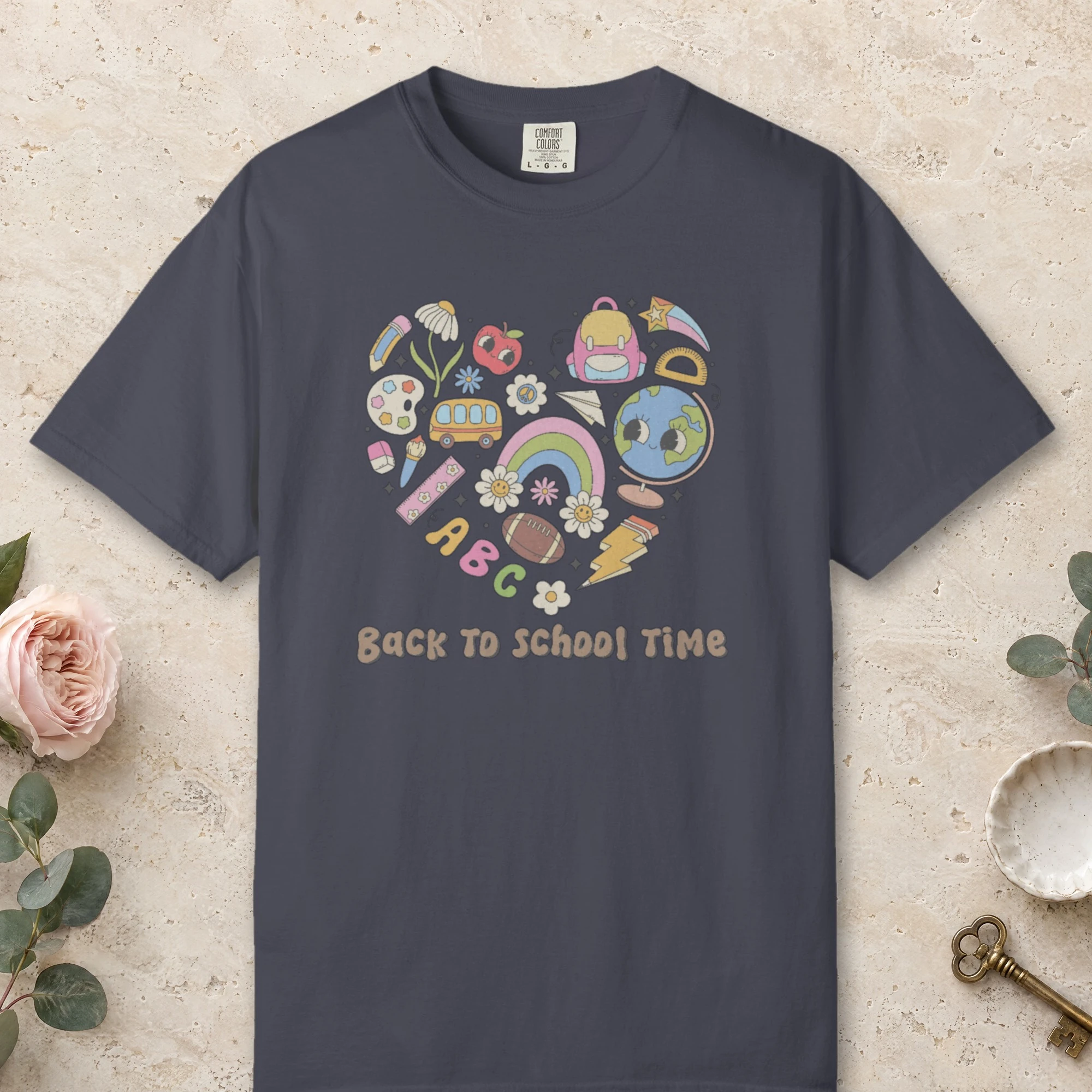 Back to School Time design on a Navy Comfort Colors 1717 tee, laid flat