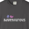 Close-up of the Be Adventurous print on a Graphite Comfort Colors 1717 tee