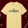 Be Determined design on a Butter Comfort Colors 1717 tee, laid flat