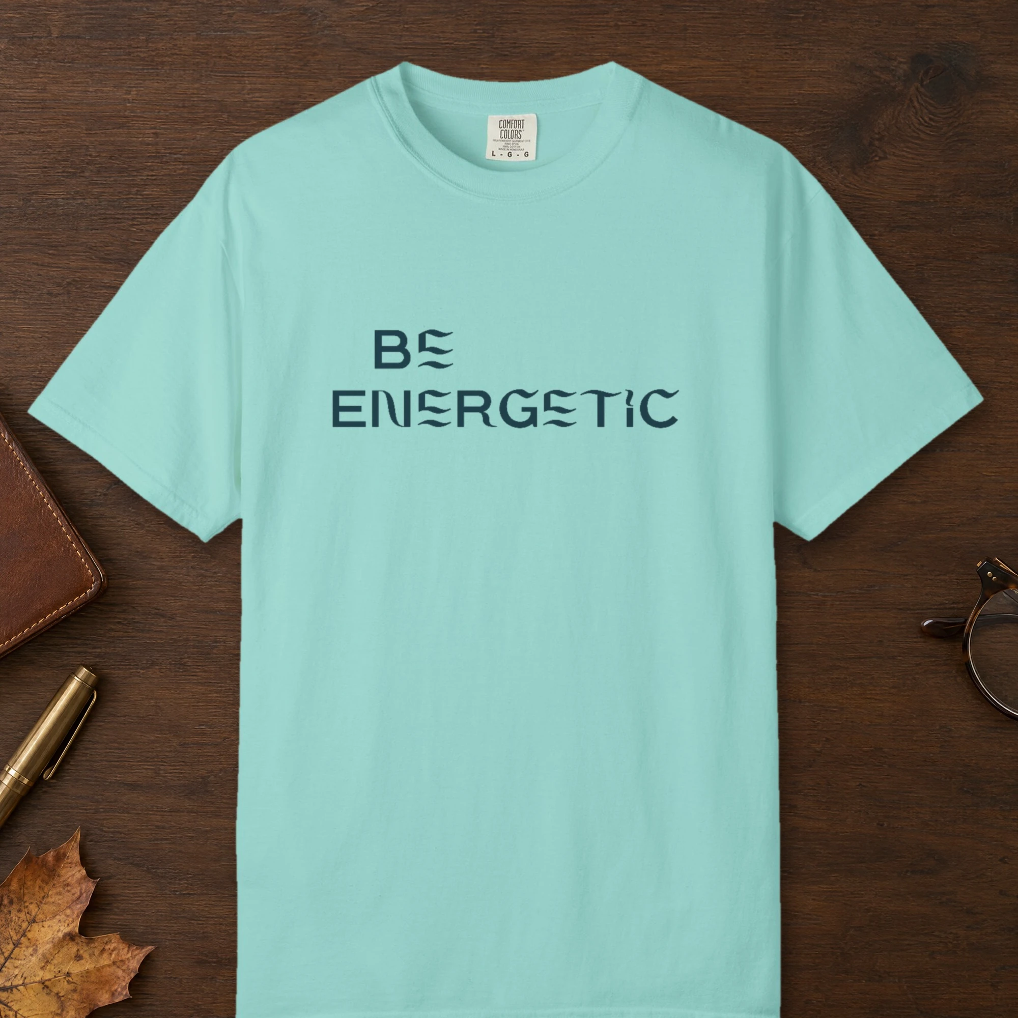 Be Energetic design on a Chalky Mint Comfort Colors 1717 tee, laid flat