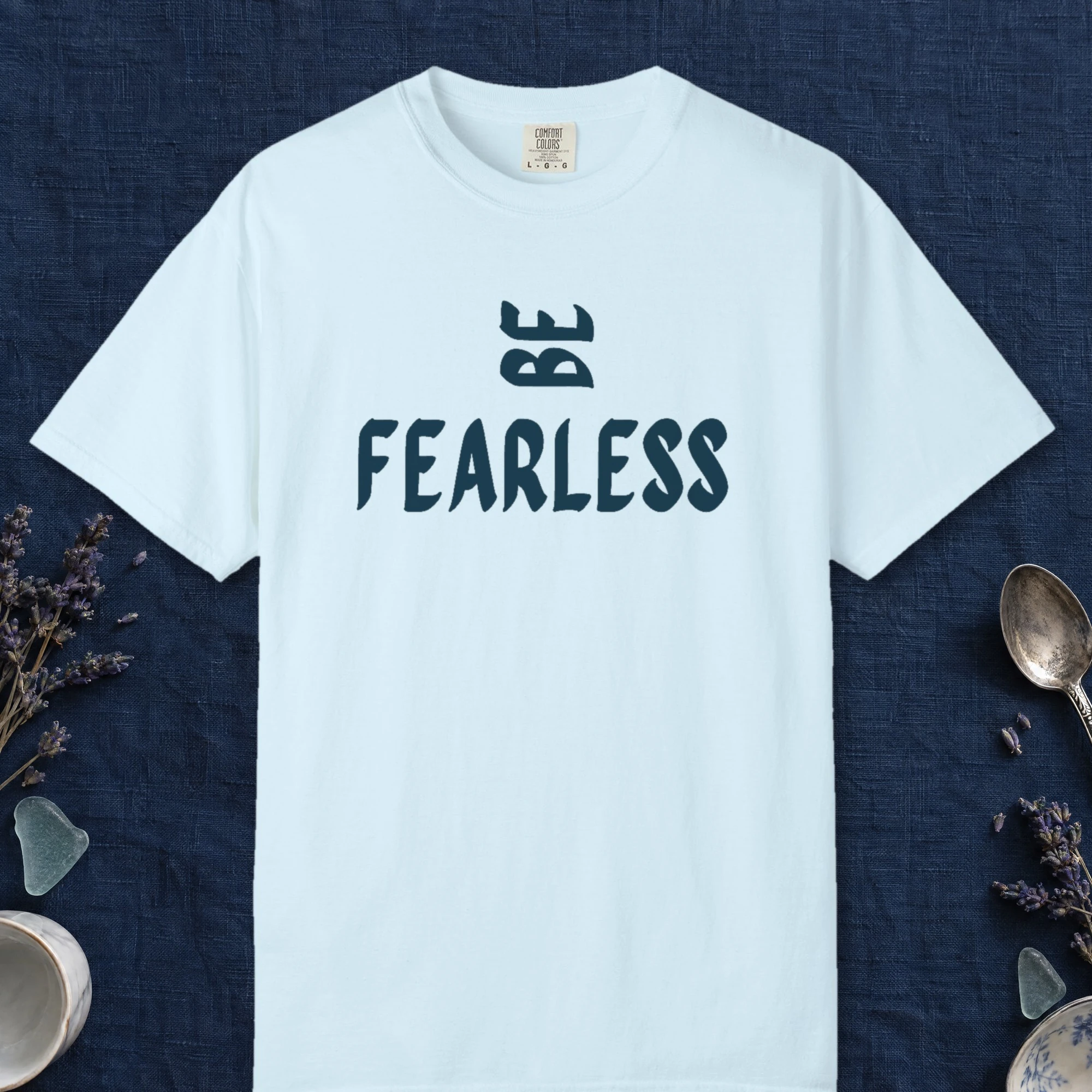 Be Fearless design on a Chambray Comfort Colors 1717 tee, laid flat