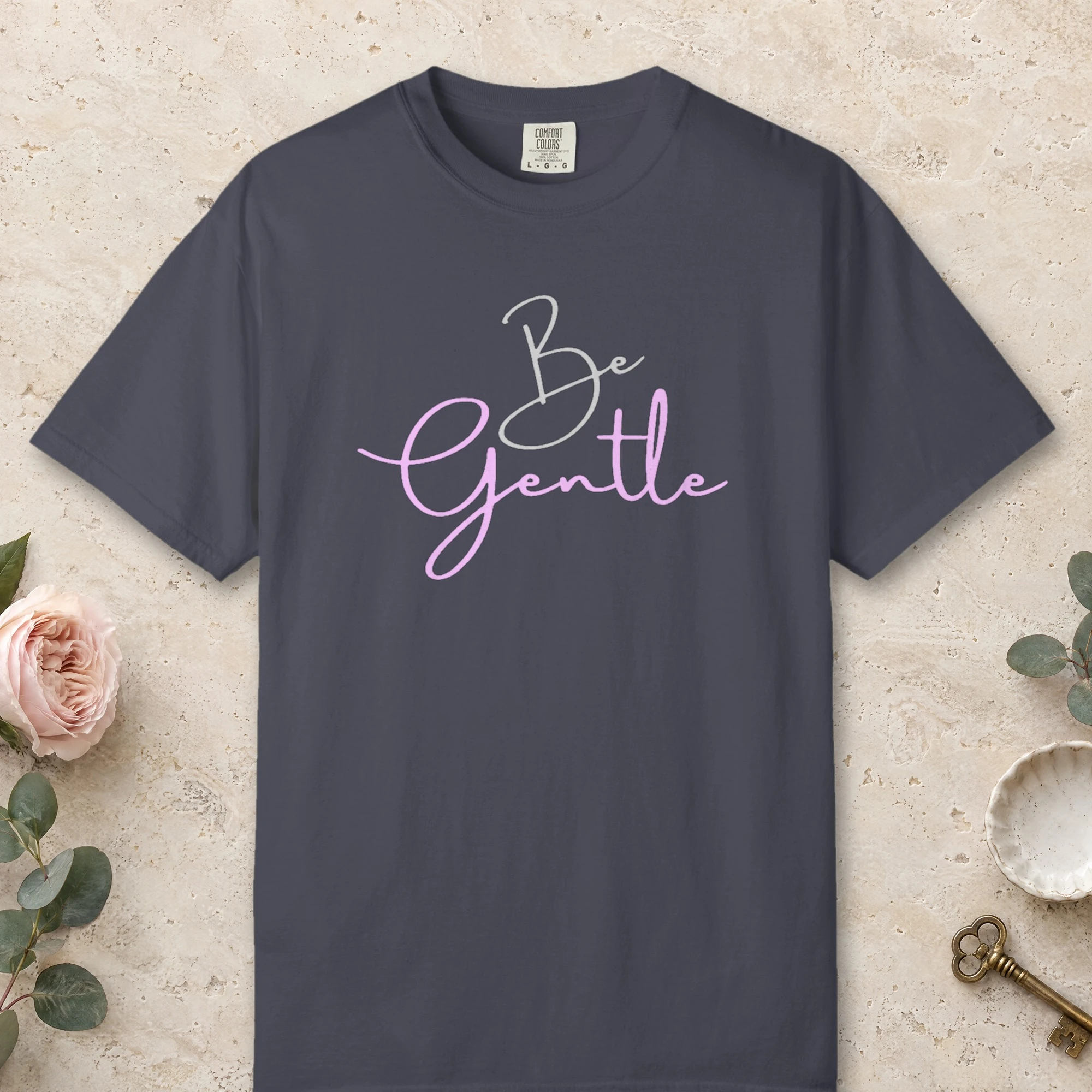 Be Gentle design on a Navy Comfort Colors 1717 tee, laid flat