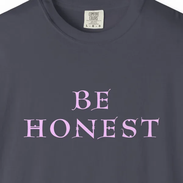 Close-up of the Be Honest print on a Navy Comfort Colors 1717 tee