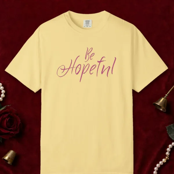 Be Hopeful design on a Butter Comfort Colors 1717 tee, laid flat