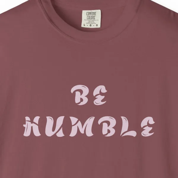 Close-up of the Be Humble print on a Brick Comfort Colors 1717 tee
