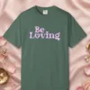be-loving-tee-blue-spruce-front Be Loving design on a Blue Spruce Comfort Colors 1717 tee, laid flat