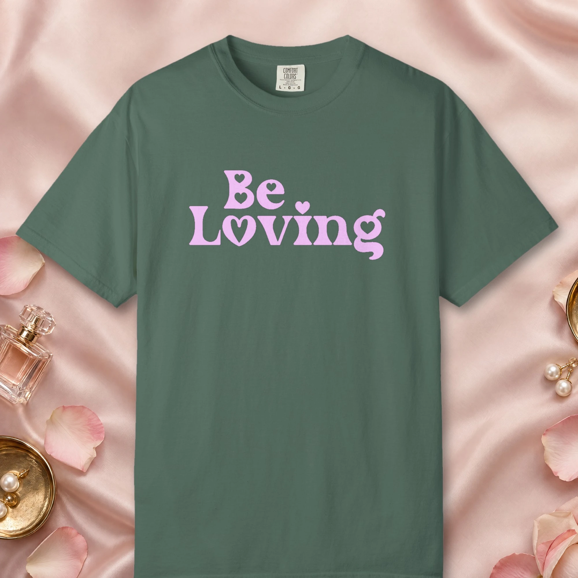 Be Loving design on a Blue Spruce Comfort Colors 1717 tee, laid flat