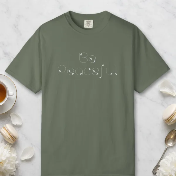 Be Peaceful design on a Moss Comfort Colors 1717 tee, laid flat