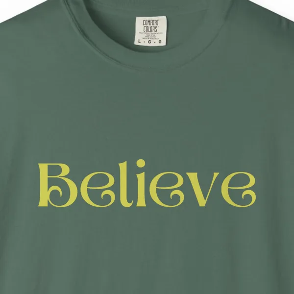believe-tee-blue-spruce-chest Close-up of the Believe print on a Blue Spruce Comfort Colors 1717 tee