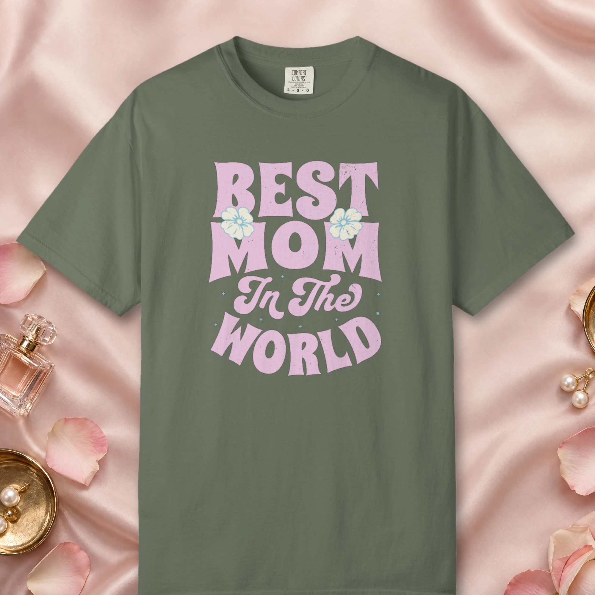 Best Mom in the World design on a Moss Comfort Colors 1717 tee, laid flat
