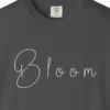 Close-up of the Bloom in Soft Handwriting print on a Graphite Comfort Colors 1717 tee
