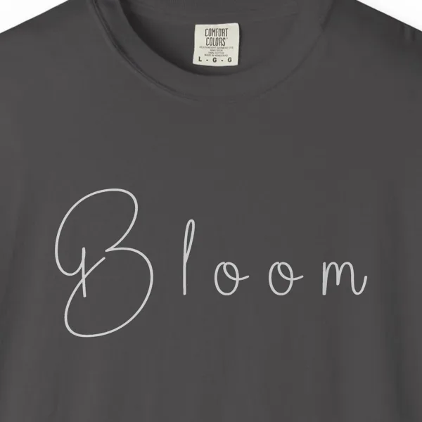 Close-up of the Bloom in Soft Handwriting print on a Graphite Comfort Colors 1717 tee