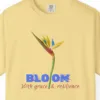 Close-up of the Bloom with Grace print on a Butter Comfort Colors 1717 tee