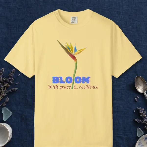 Bloom with Grace design on a Butter Comfort Colors 1717 tee, laid flat