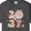 Close-up of the Bows and Disco Ball print on a Graphite Comfort Colors 1717 tee