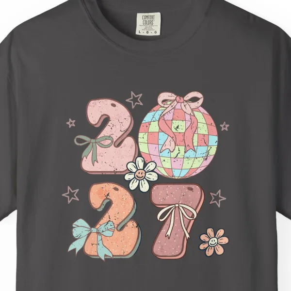 Close-up of the Bows and Disco Ball print on a Graphite Comfort Colors 1717 tee