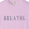 Close-up of the Breathe Art Nouveau print on a Orchid Comfort Colors 1717 tee