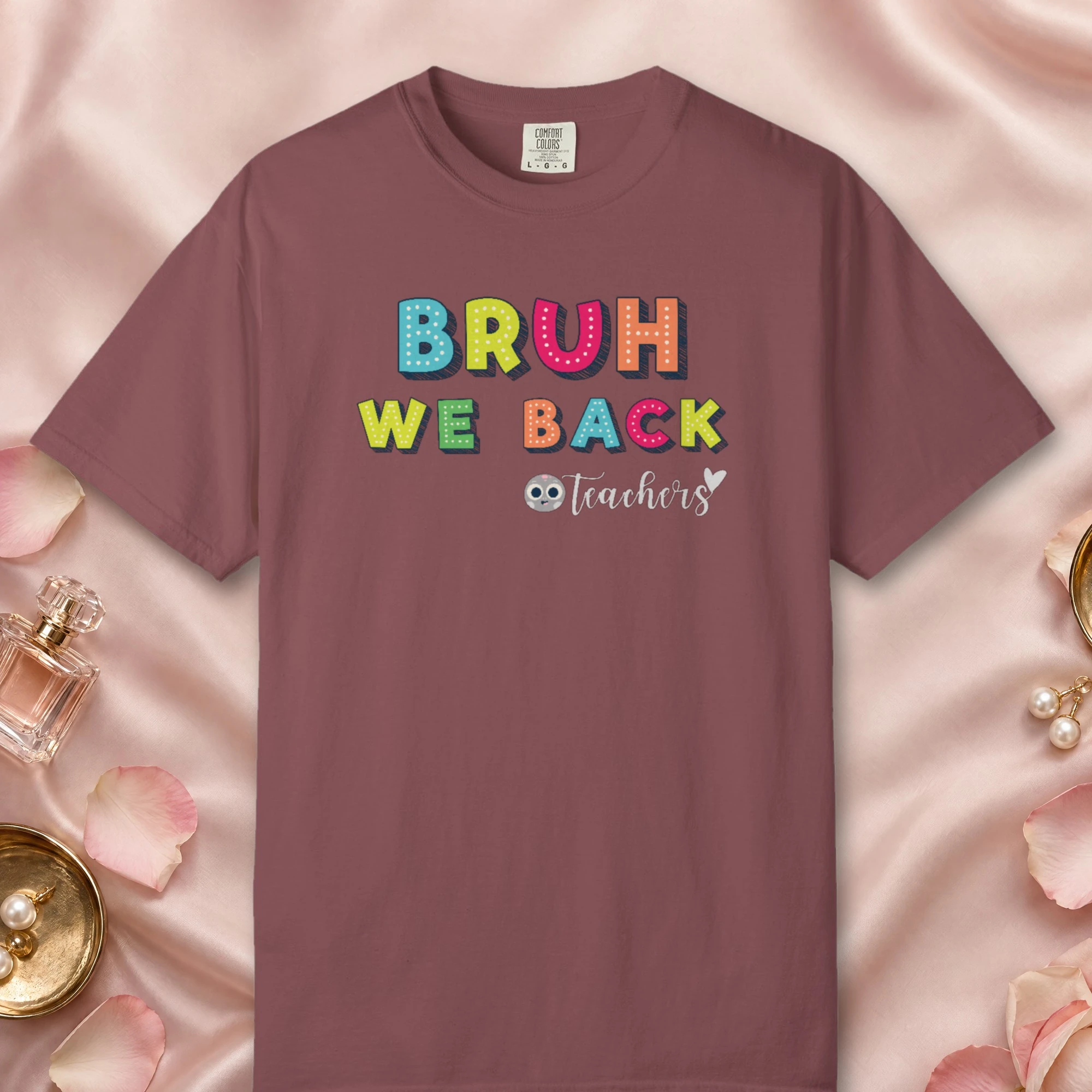 Bruh We Back design on a Brick Comfort Colors 1717 tee, laid flat