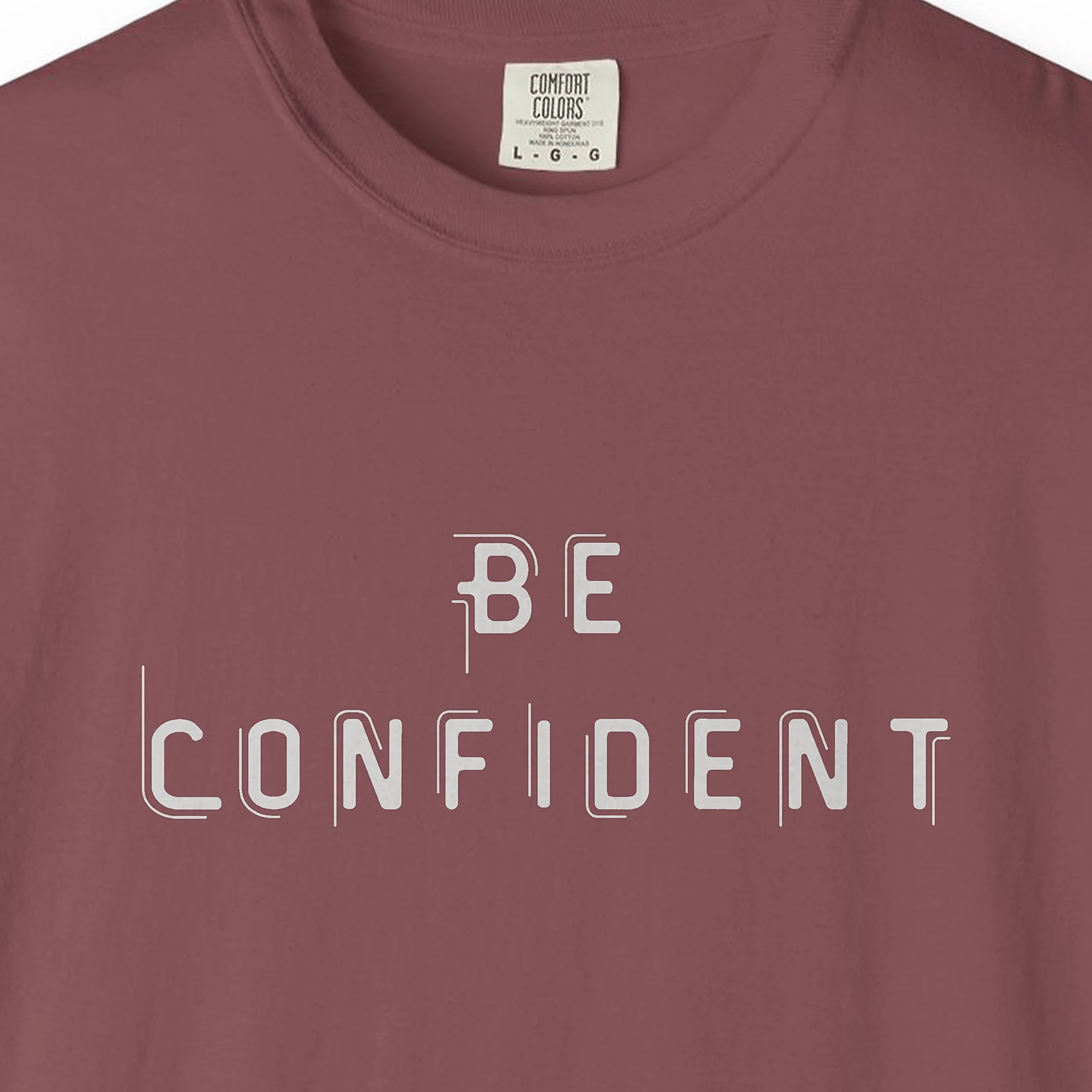 Close-up of the Calm Confidence print on a Brick Comfort Colors 1717 tee