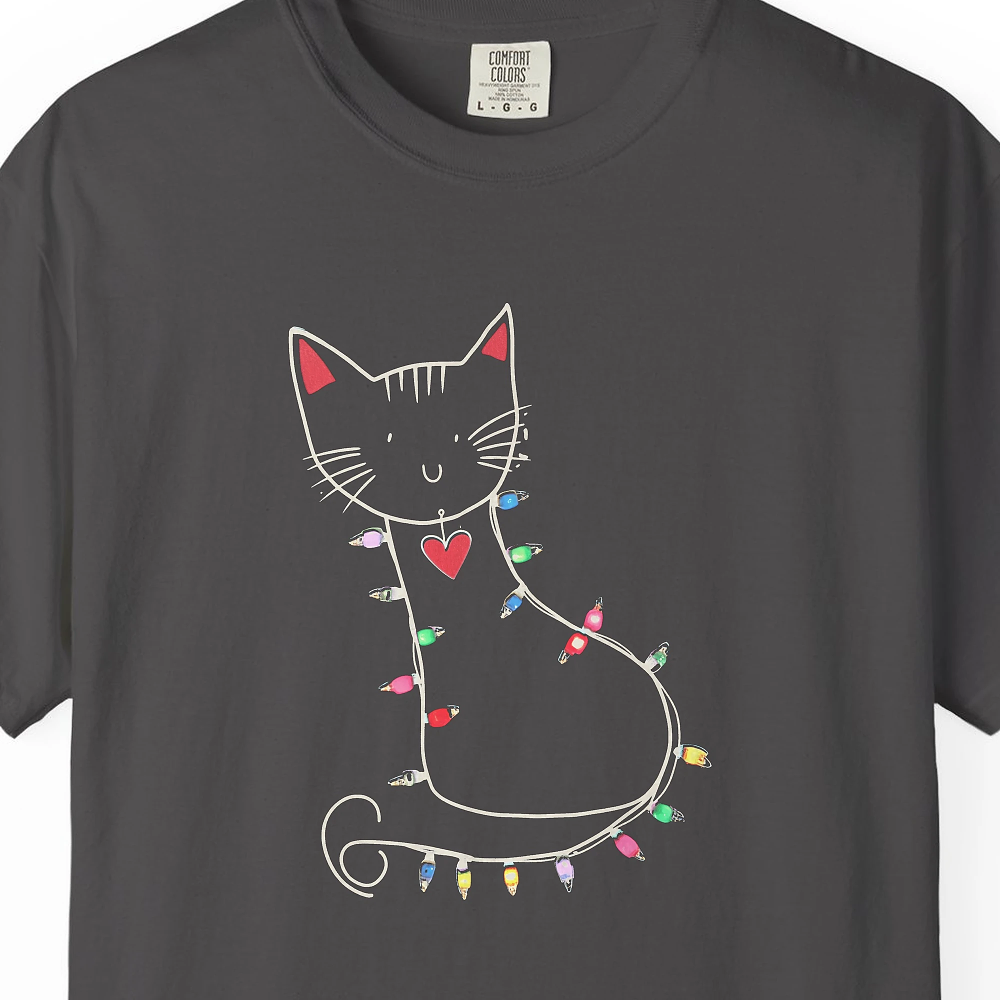 Close-up of the Cat in Holiday Lights print on a Graphite Comfort Colors 1717 tee