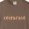 Close-up of the Celebrate print on a Espresso Comfort Colors 1717 tee