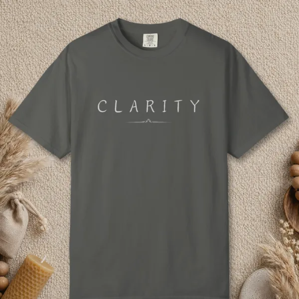 Clarity Crest design on a Pepper Comfort Colors 1717 tee, laid flat