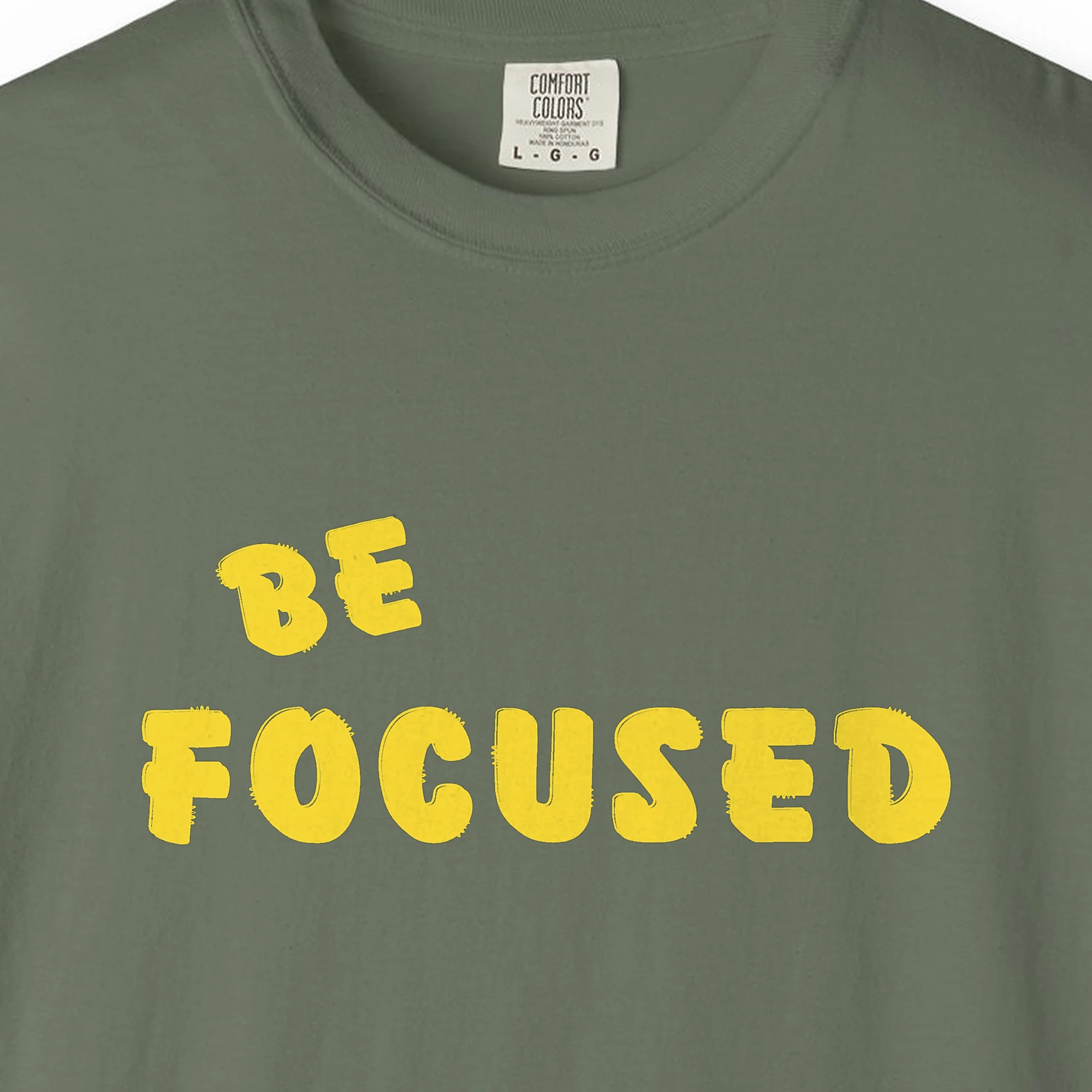 clear-focus-tee-moss-chest Close-up of the Clear Focus print on a Moss Comfort Colors 1717 tee