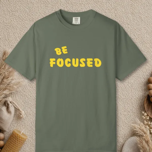 Clear Focus design on a Moss Comfort Colors 1717 tee, laid flat
