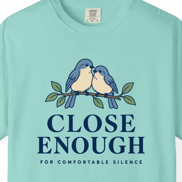 close-enough-tee-chalky-mint-chest Close-up of the Close Enough print on a Chalky Mint Comfort Colors 1717 tee