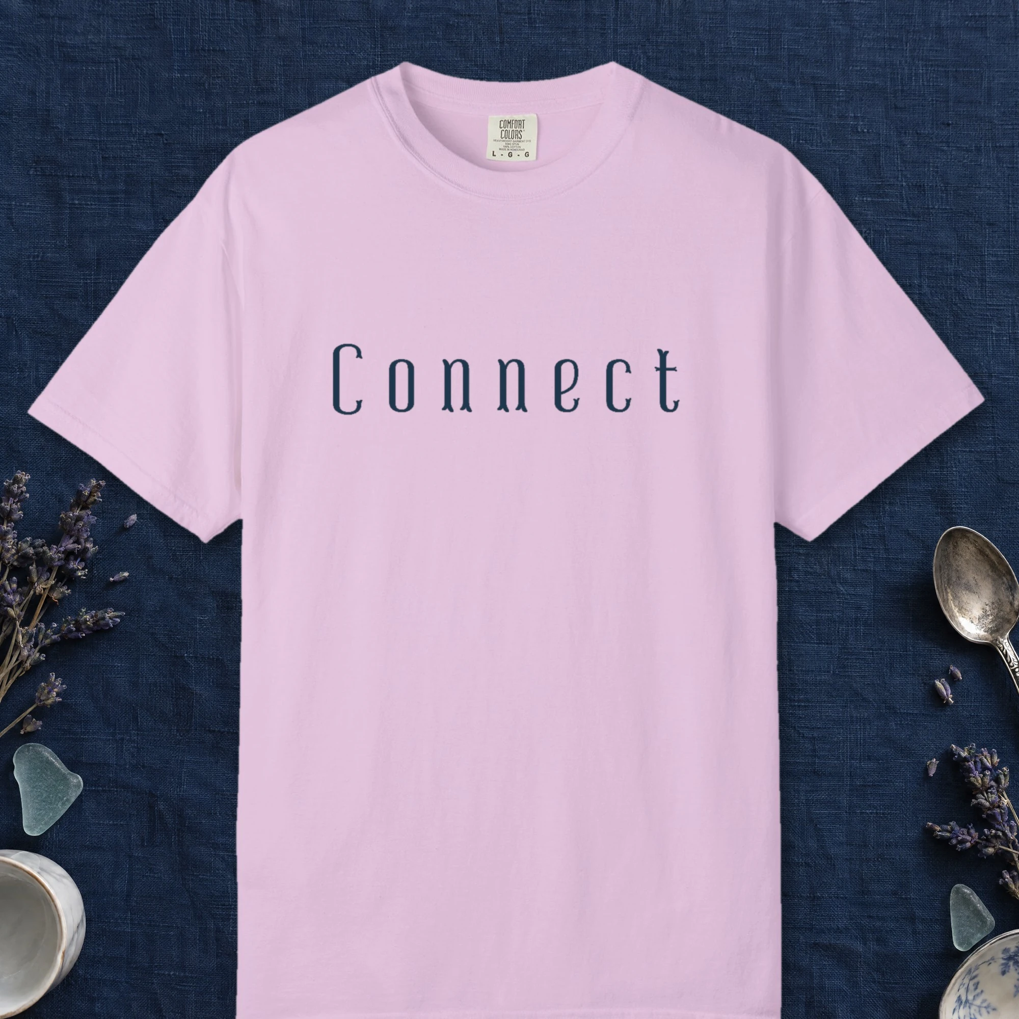 Connect Vintage Letter design on a Orchid Comfort Colors 1717 tee, laid flat