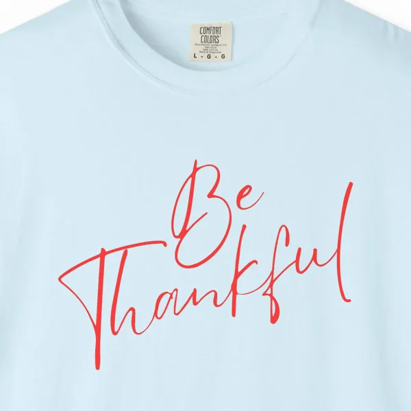 daily-gratitude-tee-chambray-chest Close-up of the Daily Gratitude print on a Chambray Comfort Colors 1717 tee