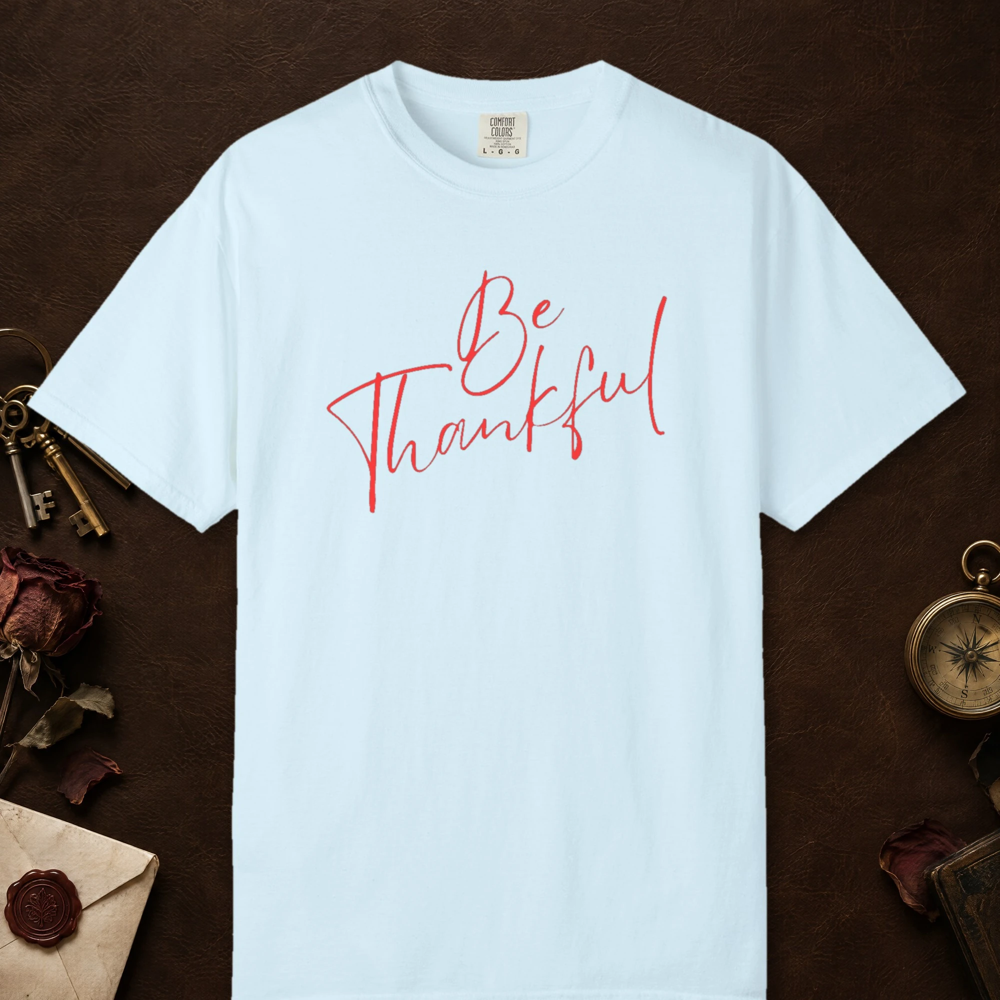 Daily Gratitude design on a Chambray Comfort Colors 1717 tee, laid flat
