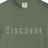 Close-up of the Discover Inline print on a Moss Comfort Colors 1717 tee