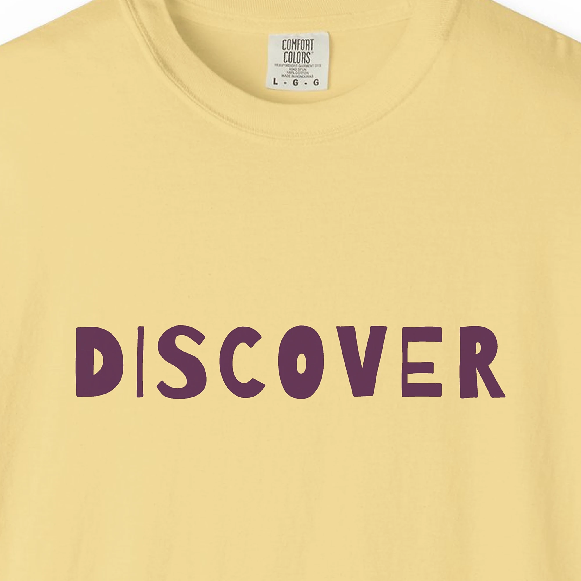 discover-tee-butter-chest Close-up of the Discover print on a Butter Comfort Colors 1717 tee