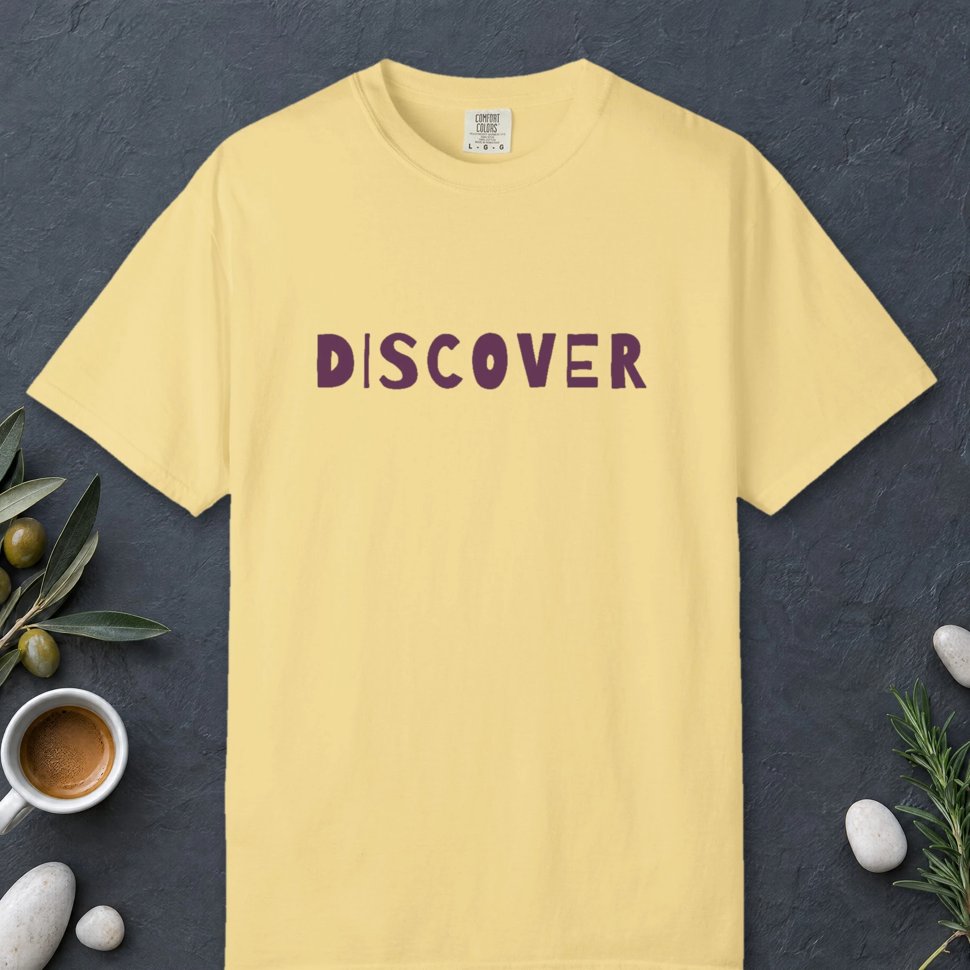 Discover design on a Butter Comfort Colors 1717 tee, laid flat