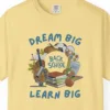Close-up of the Dream Big Learn Big print on a Butter Comfort Colors 1717 tee