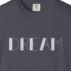 Close-up of the Dream print on a Navy Comfort Colors 1717 tee
