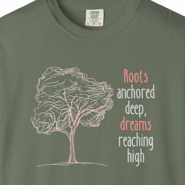 Close-up of the Dreams Reaching High print on a Moss Comfort Colors 1717 tee