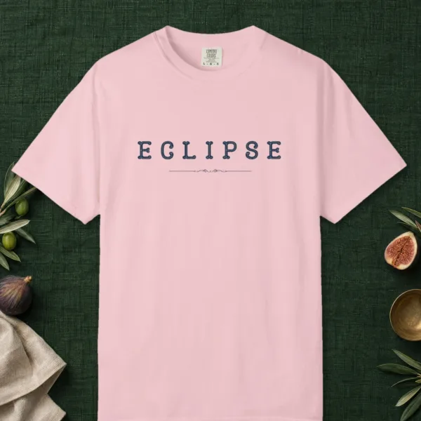 eclipse-inline-tee-blossom-front Eclipse Inline design on a Blossom Comfort Colors 1717 tee, laid flat