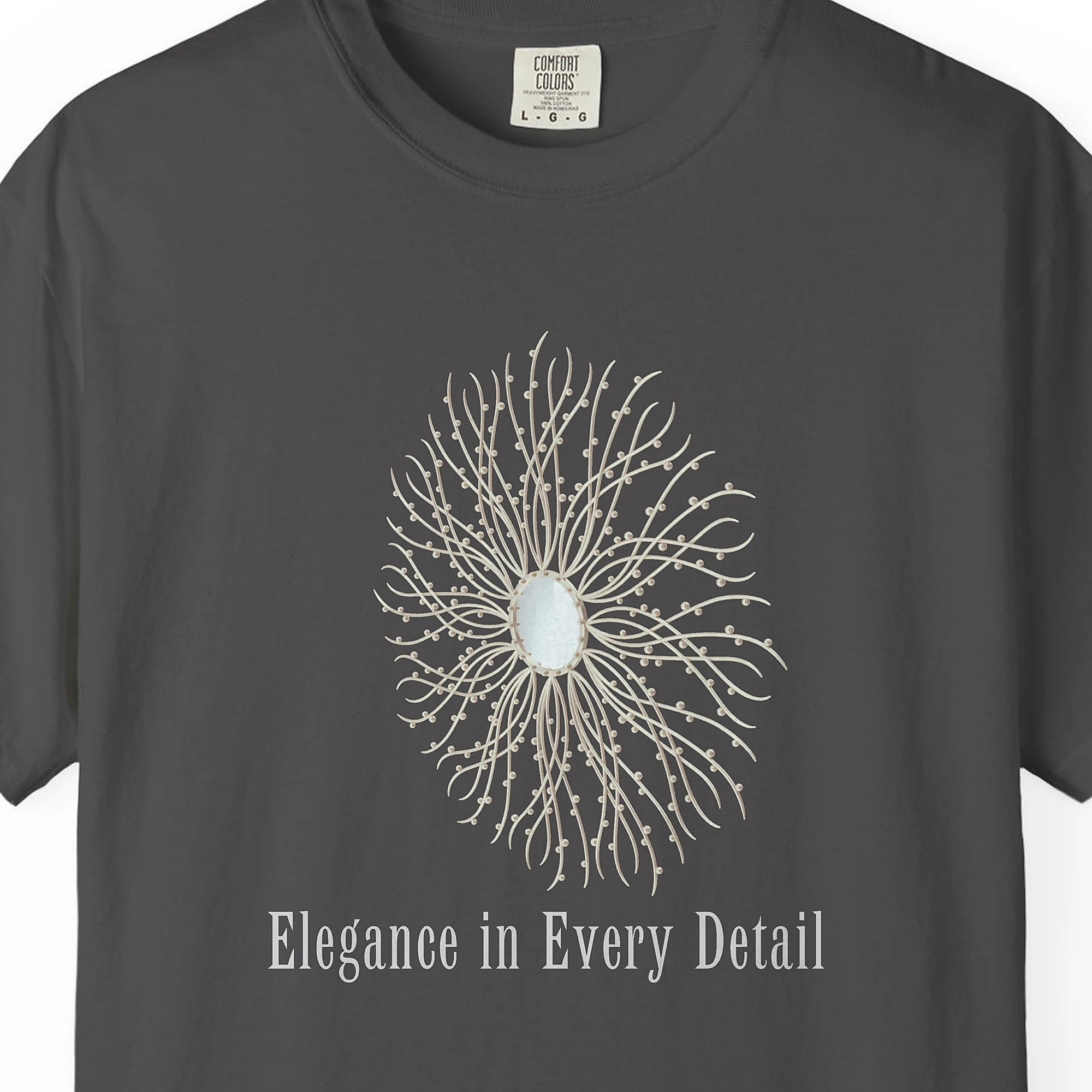Close-up of the Elegance in Every Detail print on a Graphite Comfort Colors 1717 tee
