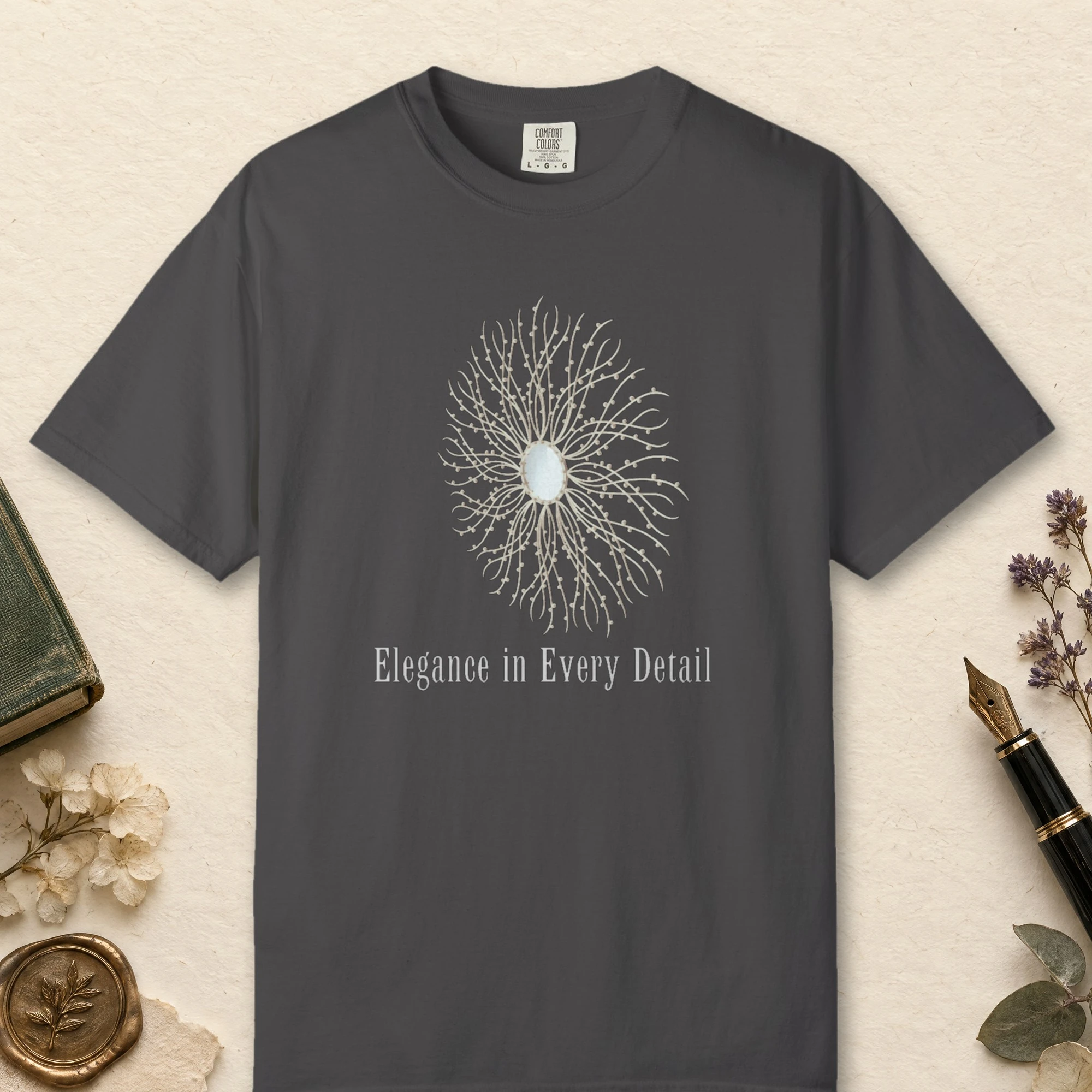 Elegance in Every Detail design on a Graphite Comfort Colors 1717 tee, laid flat